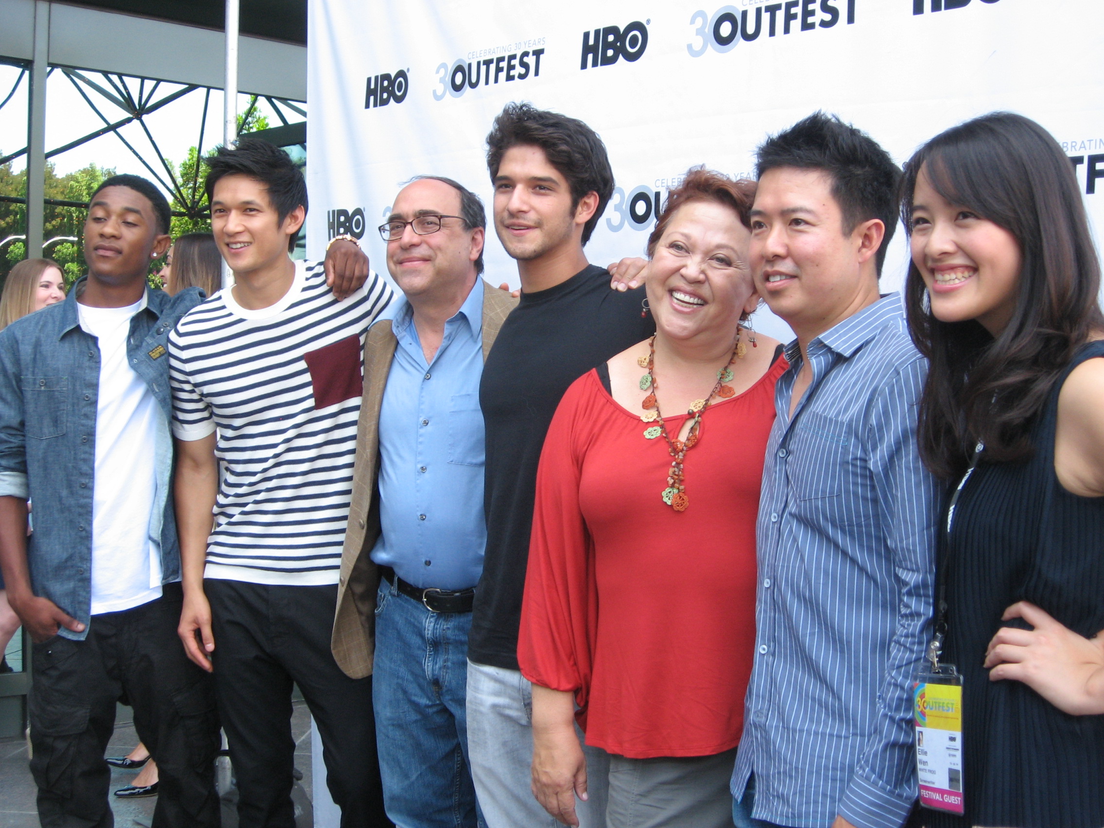 Cast and crew on the red carpet at the Outfest screening (Ellie Wen in foreground). 